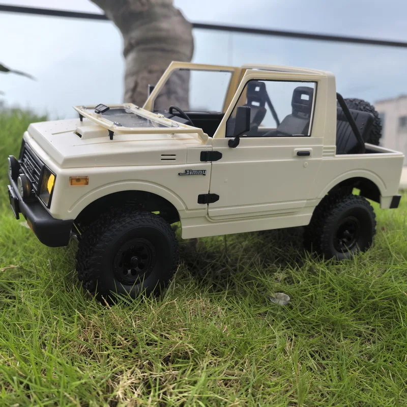 

Новинка 2024 года, Wpl C74-1, версия с открытым верхом Jimny 2,4 г, внедорожник с дистанционным управлением, полномасштабный автомобиль с 4 колесами, альпинистский автомобиль, игрушечный автомобиль