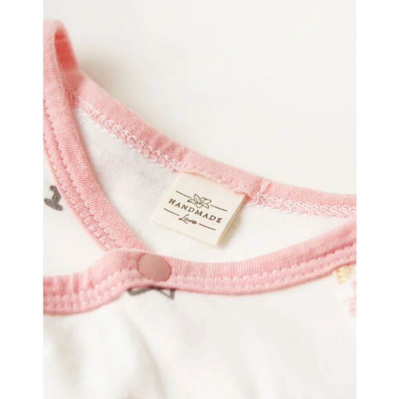 Hand-folded spot shipping mark head tulip bouquet smiling face cloth label accessories sewing DIY side label.