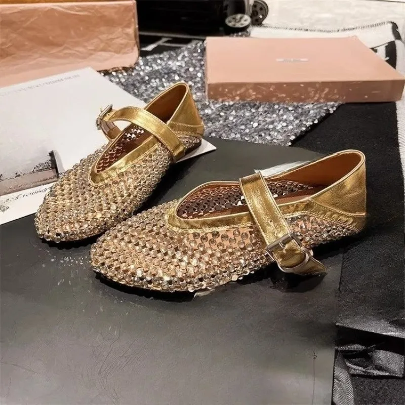 Nuevo Rhinestone lleno de diamantes red de pesca ahuecada una palabra Mary Zhen Baotou zapatos planos individuales sandalias de punta redonda para mujer