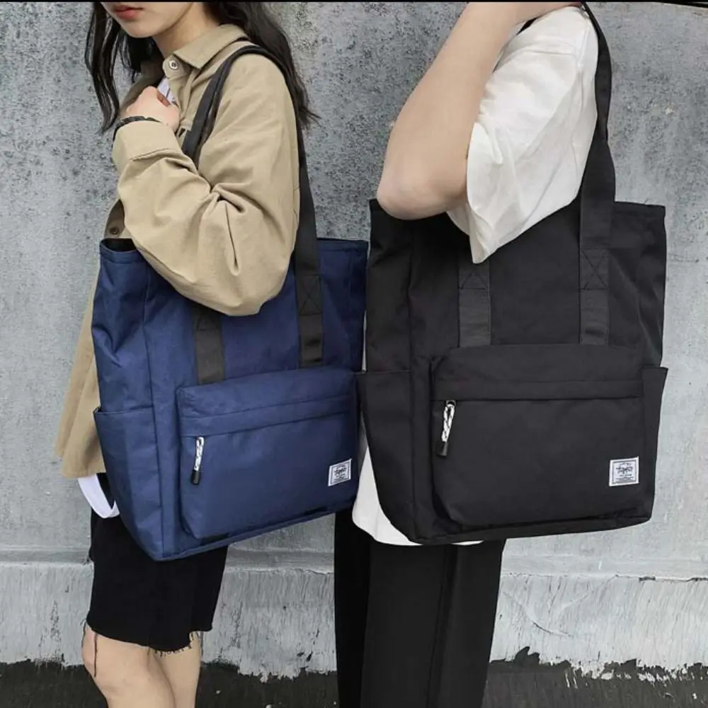กระเป๋าสะพายข้างกันน้ำสำหรับผู้ชาย กระเป๋าถือลำลองความจุขนาดใหญ่สำหรับผู้หญิง กระเป๋าโท้ทสำหรับเดินทางไปทำงาน กระเป๋าถือผู้หญิงเรียบง่ายสำหรับการเดินทางท่องเที่ยวกลางแจ้ง