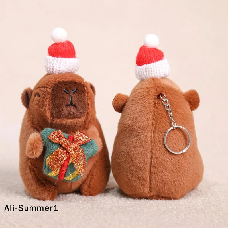 【E】Uroczy świąteczny breloczek z kapibarą, pluszowa zawieszka, miękka wypchana lalka, ozdoba do plecaka, prezent na Nowy Rok