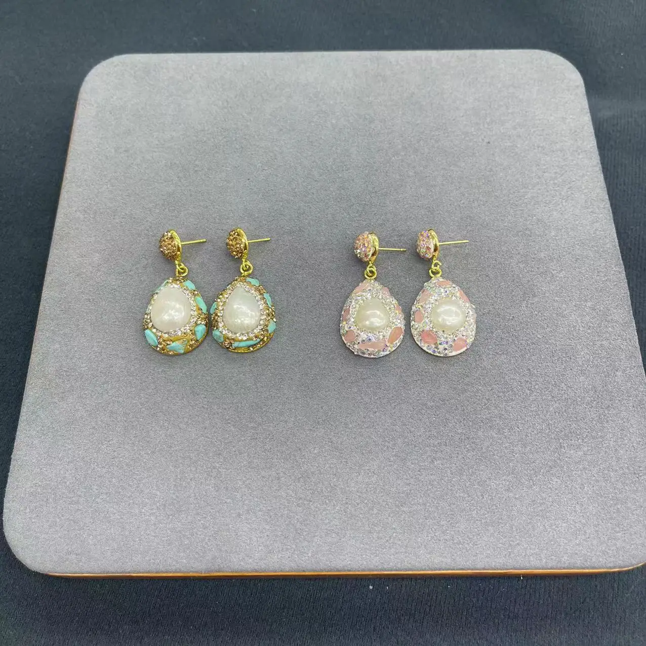 

Natural Baroque pearl inlaid rough stone small gravel exquisite earrings, hot-selling European soft pottery point craftsmanship