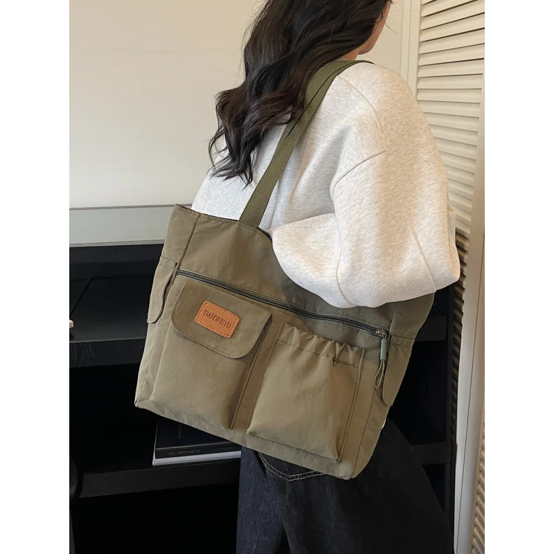 

2026New style cloth tote bag for women, large-capacity commuter bag, versatile casual shoulder handbag for college students
