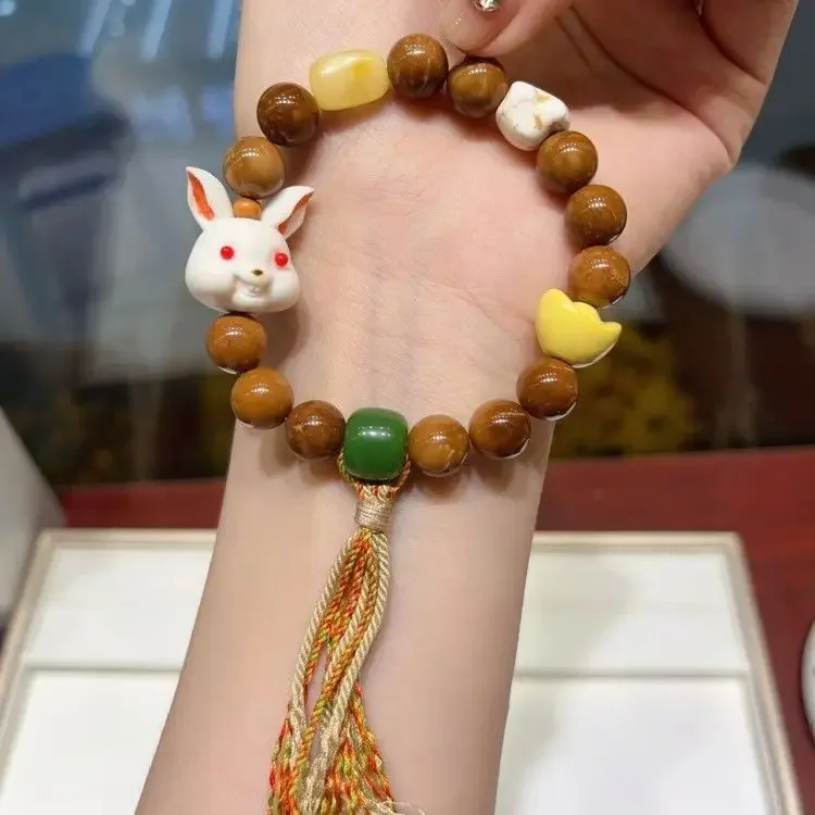 

Cook Duobao bracelet with simple pairing of deer antlers, rabbits, natural beeswax, turquoise, and retro style to attract wealth