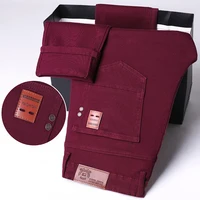Pantalones vaqueros ajustados elásticos fucsia para hombre, cómodos pantalones rectos informales de negocios, moda coreana, pantalones vaqueros de Color sólido