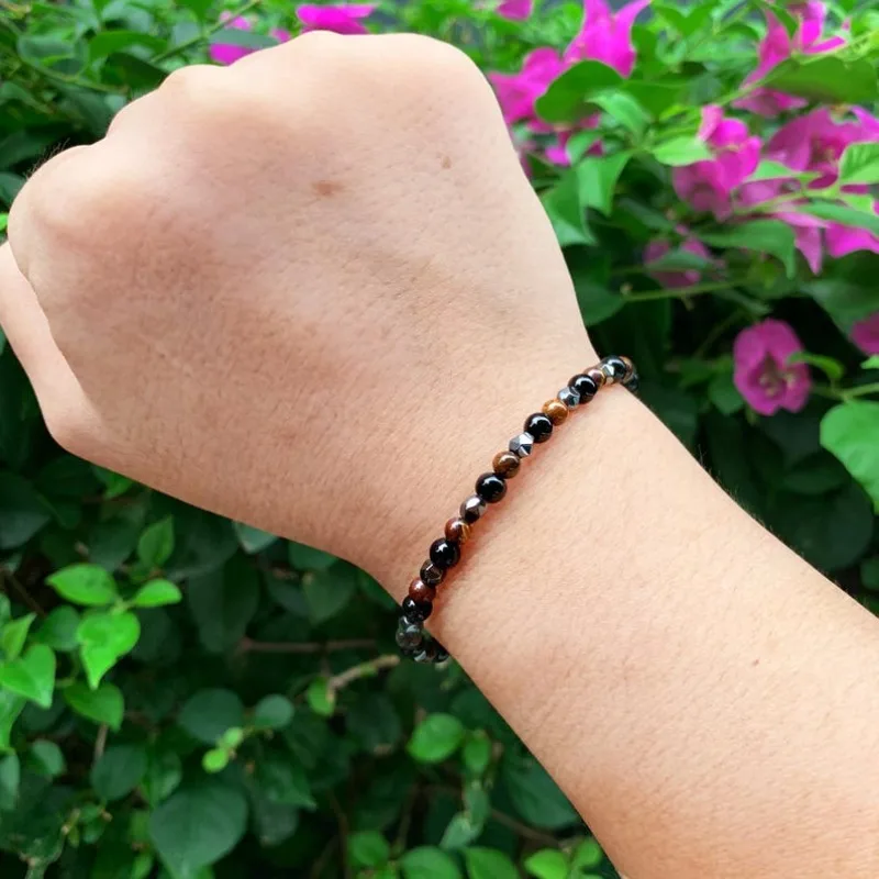 A simple bracelet with triple protection of obsidian, tiger's eye and hematite
