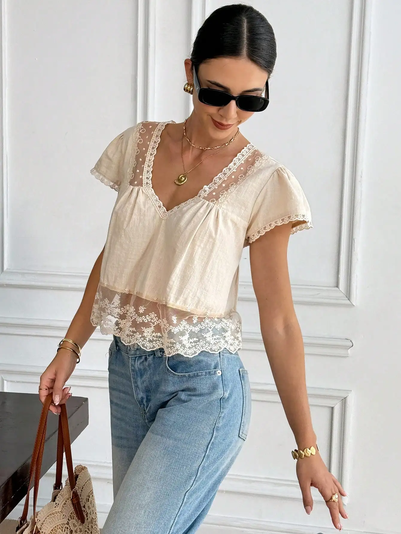 

Lace Patchwork V-Neck Short Sleeve Blouse With Back Tie Design