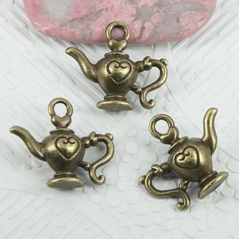 

10pcs antiqued bronze color 2sided pattern heart teapot charms EF0909