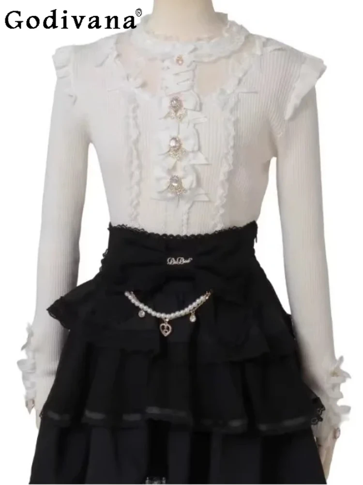 

Sweet Japanese New Lolita Lace Splicing Sweater Cute Girl Versatile Slim Age-reducing Long Sleeve Solid Color Bow Knitted Top