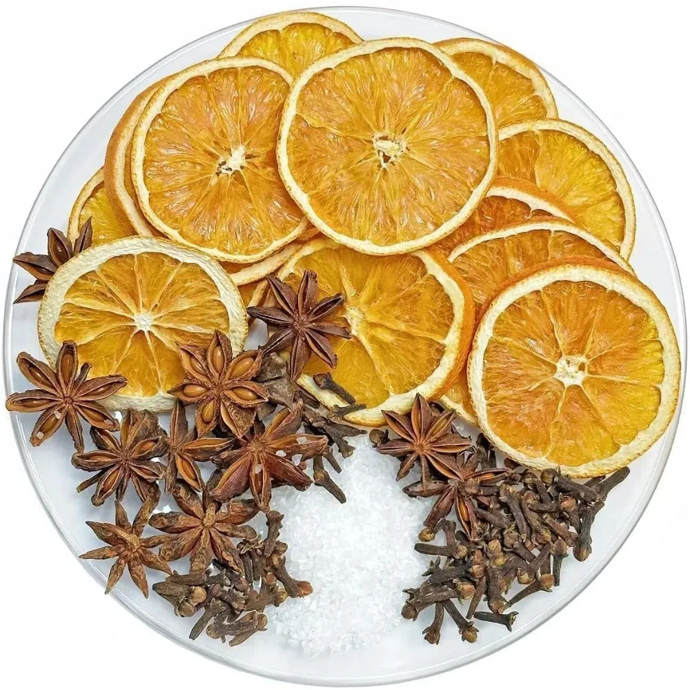potpourri simmering, tis la temporada potpourri con rodajas de naranja seca, anís estrellado, clavo y sal de vainilla, olla simmer