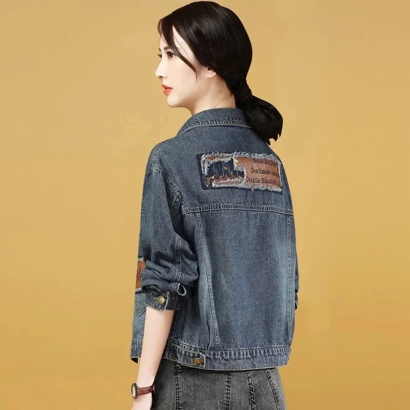 แจ็คเก็ตยีนส์ผู้หญิงไซส์ใหญ่ 5XL สไตล์คาวบอย แฟชั่นยุโรป ลำลอง ตกแต่งผ้าแบบแพทช์เวิร์ค ทรงหลวม สำหรับฤดูใบไม้ผลิและฤดูใบไม้ร่วง