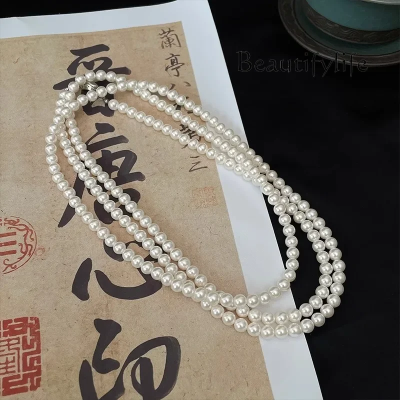 New Chinese long pearl necklace women's light luxury high-end accessories sweater chain stacked neck chain