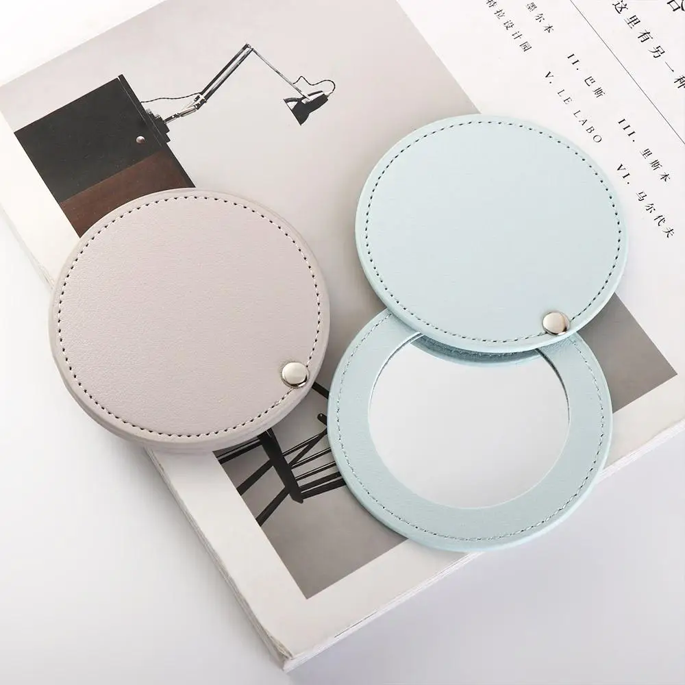 Miroir de maquillage rotatif en cuir PU pour femmes et filles, miroir de poche compact, ultra-fin, accessoires de voyage, cosmétique, cadeau pour elle