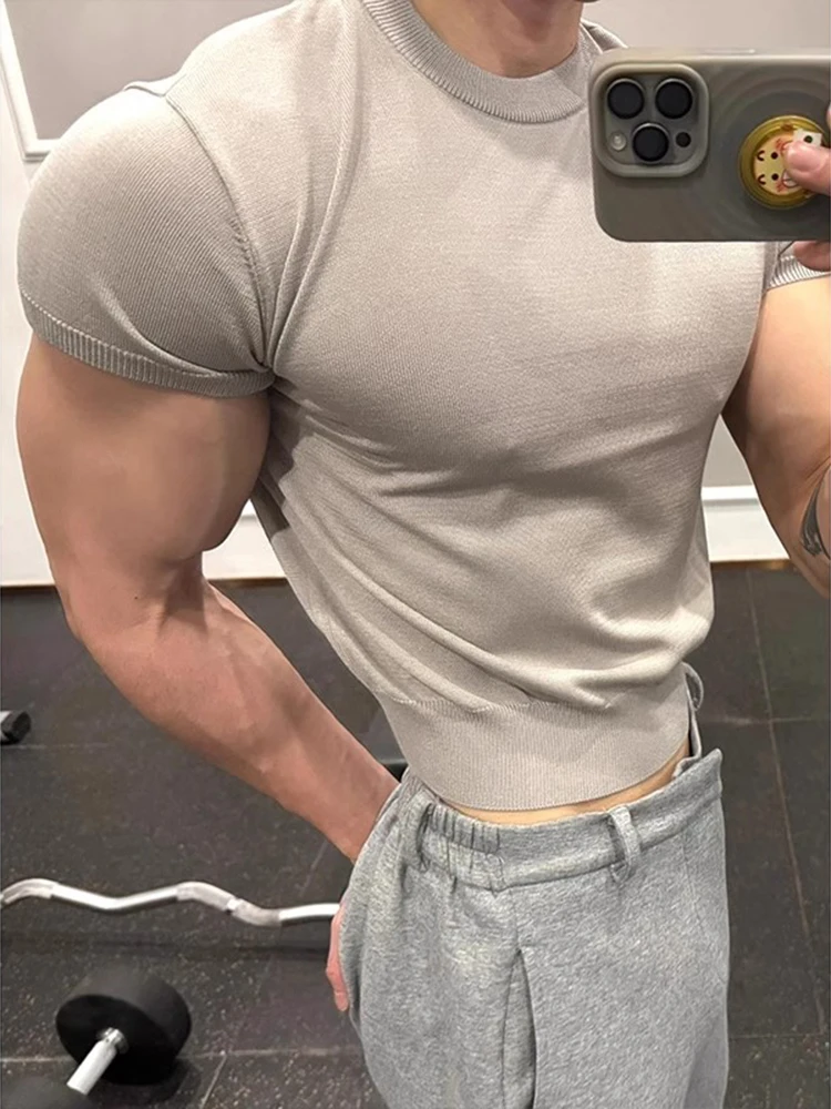 

Cleanfit Knitted Slim Fit ort Sve Men's T-irt Summer Fitn Muscle Highlightened Cuffed American oulder T-irt