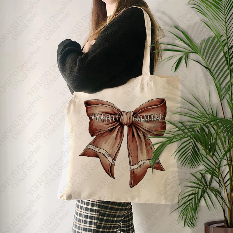 1 pc Fall Football Bow patternTote Bag Canvas Shoulder Bag For Travel Daily Commute Women's Reusable Shopping Bag