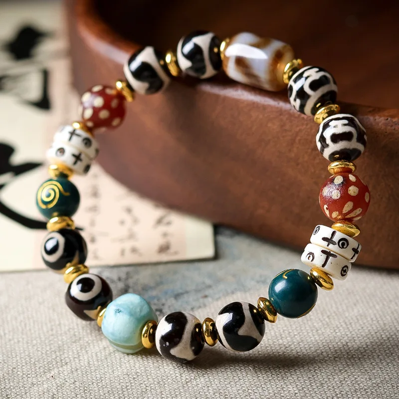 Original design tiger tooth jewelry bottle, three-eyed dzi , deer antler separator, multi-bead bracelet, cultural t
