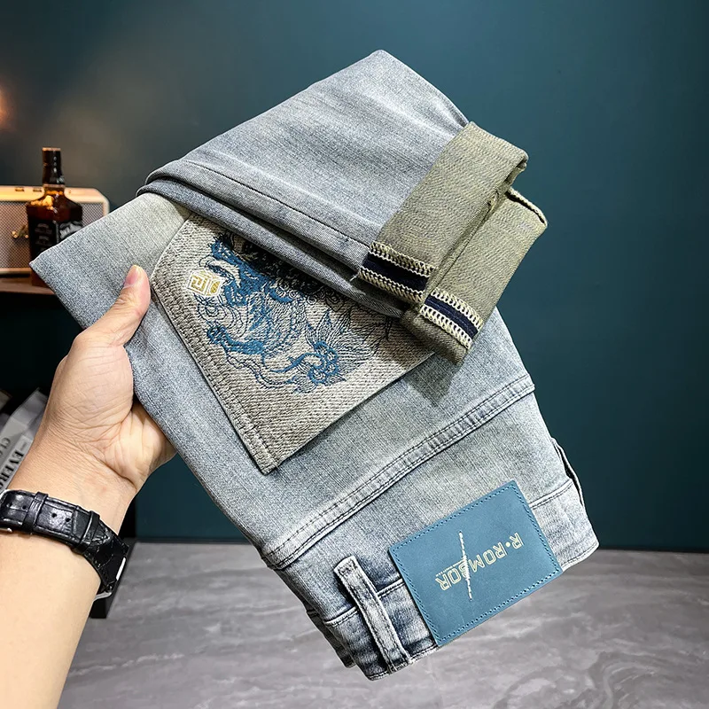 

LB8292 Light luxury embroidery broken holes patch jeans men's Slim small feet spring new tide elastic leisure trousers