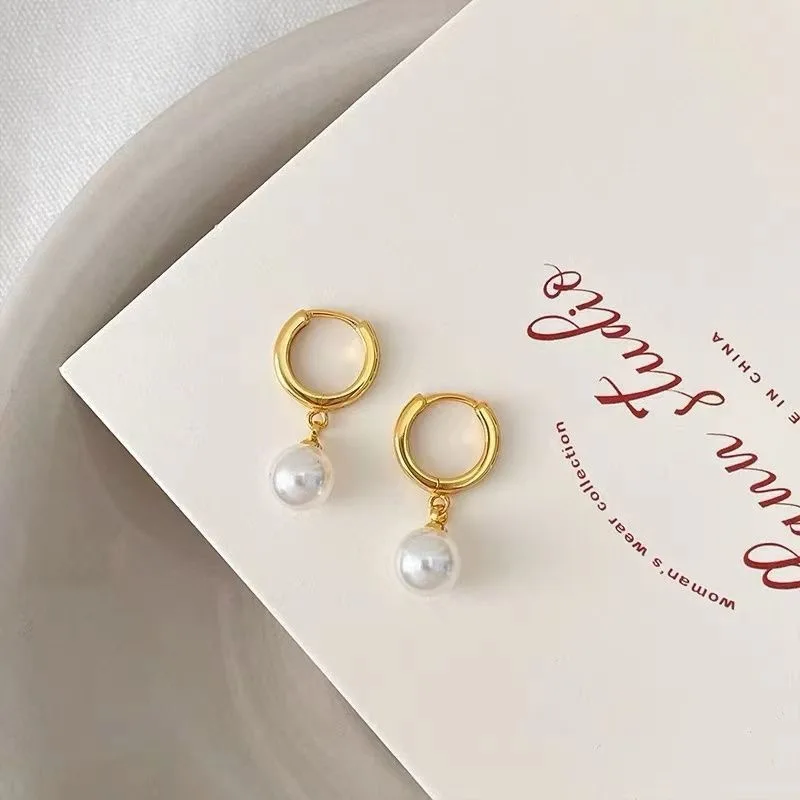

Pearl huggie hoop pendant earrings with charm