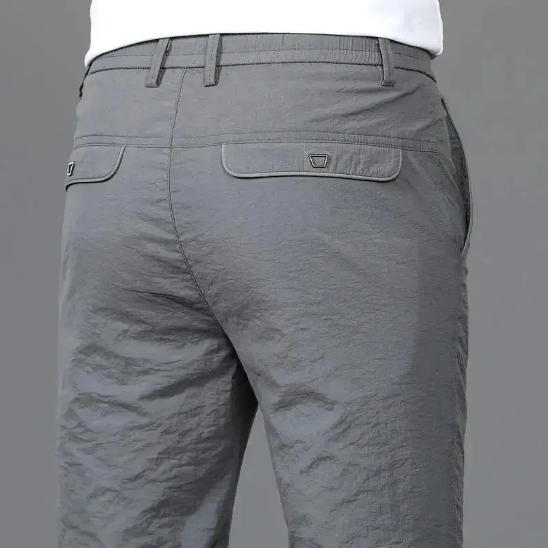 

Корейские отзывы, множество мужских одежды, летние ультратонкие повседневные деловые облегающие брюки из ледяного шелка, модные спортивные летние брюки