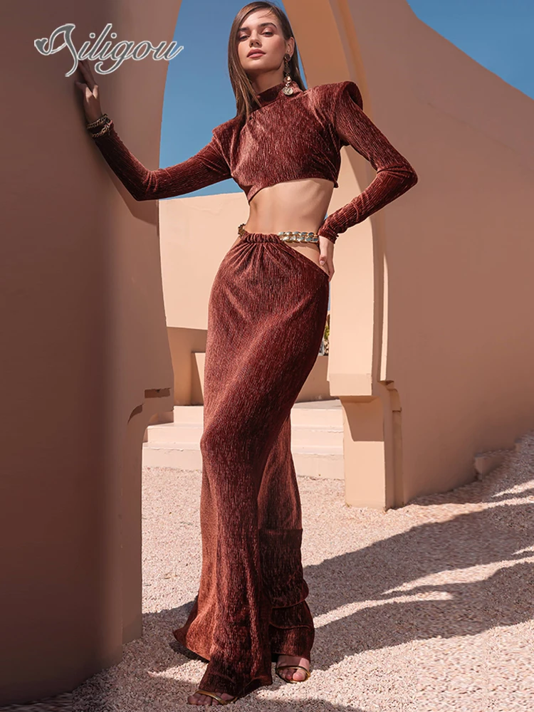 

Ailigou 2023 New Summer Women's Sexy Long Sleeve Chain Hollow Tight Two Piece Short Top Long Skirt Celebrity Party Women's Set