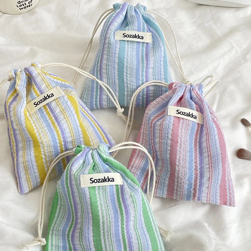 กระเป๋าแต่งหน้าของผู้หญิงญี่ปุ่นจีบลายเชือกรูดกระเป๋าแบบพกพาขนาดกะทัดรัดกระเป๋าเดินทางธุรกิจกระเป๋าเครื่องสำอางสำหรับสาว