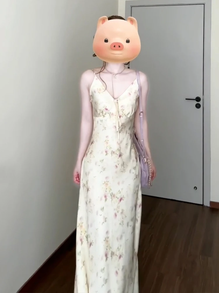 กระโปรงยาวลายดอกไม้สไตล์เกาหลีสำหรับผู้หญิง รุ่นใหม่ประจำฤดูร้อนปี 2025 เอวสูง ใส่สบาย นุ่ม เบาสบาย เหมาะสำหรับใส่ไปเที่ยวทะเล