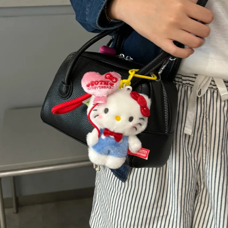 Sanrio 50 aniversario Hello Kitty mochila colgante serie Linda muñeco de peluche Anime relleno llavero juguete de dibujos animados regalo de cumpleaños ﻿