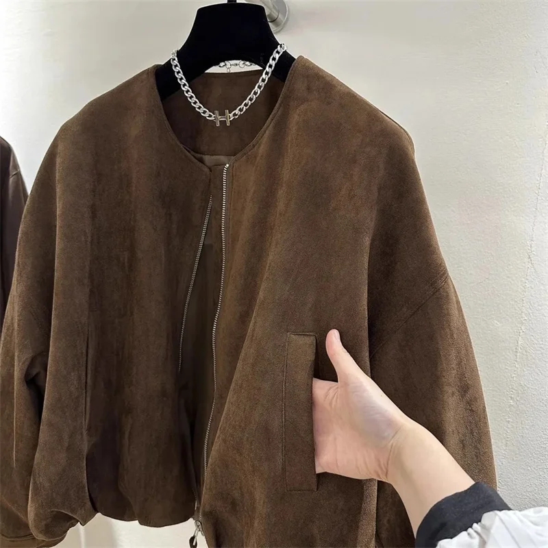 2025 أنثى موضة Lmitation الجلد المدبوغ القمم سترة ربيع الخريف المرأة الجولة الرقبة أبلى السيدات الأمريكية طويلة الأكمام معطف قصير