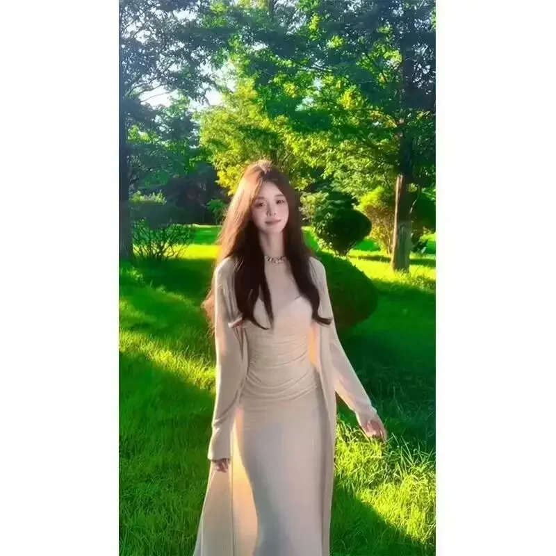 فستان طويل مثير بقصة ضيقة ومجموعة سترة محبوكة للنساء لربيع وصيف نمط جديد خفيف الوزن تنورة بحزام رائج