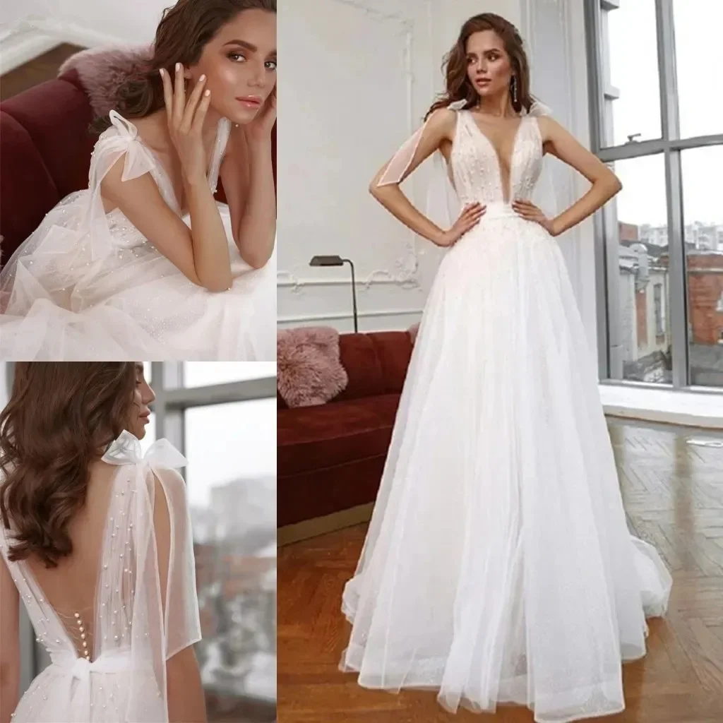 Sexy scollo a v fiocco pizzo perla a-line abito da sposa con scollo a v Sexy abito da sposa da giardino gonna spazzata plus size abito senza schienale de Mariee