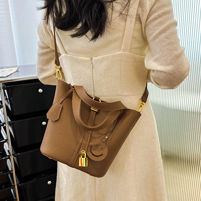 2024 Niche Design New Women's Bag Pebbled Solid Color Handbag Simple Casual Single Shoulder Diagonal Bucket Bag Hand Bag