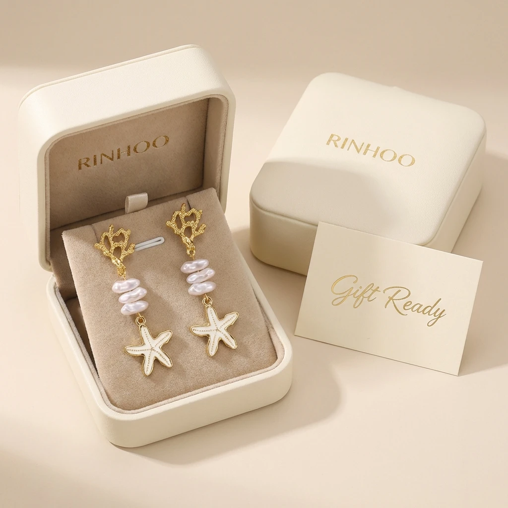 Goldfarbene Korallen-Seestern-Ohrhänger für Damen, trendige weiße Emaille, glänzende Imitationsperlen-Tropfenohrringe, hübscher Strandschmuck – Detail 5