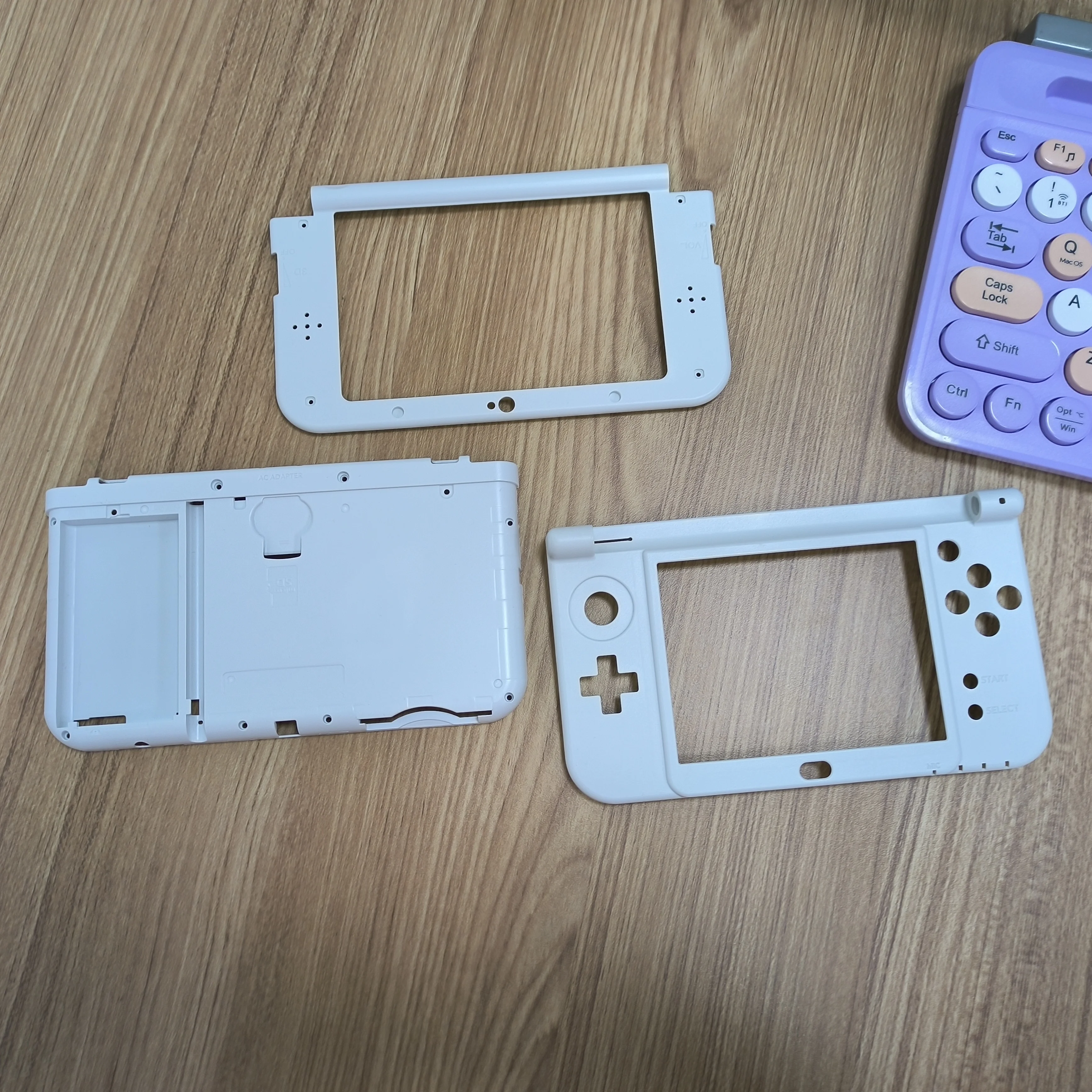 Custodie per batterie e telaio centrale superiore e inferiore originali per la NUOVA console 3DS XL/LL