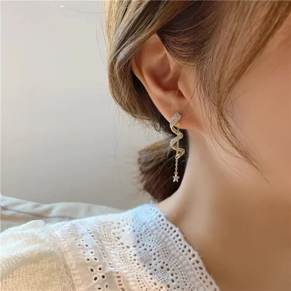 

Sweet Star Tassel Earrings Sparkling Silver Plated Hypoallergenic Drop Earrings Spinning Spiral Geometric Distorted