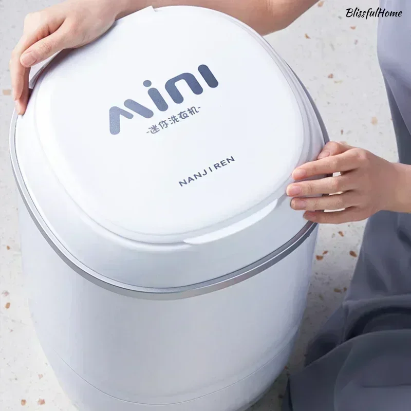 New portable washing machine. Automatic. Household. Small. For integrated washing of underwear and socks.
