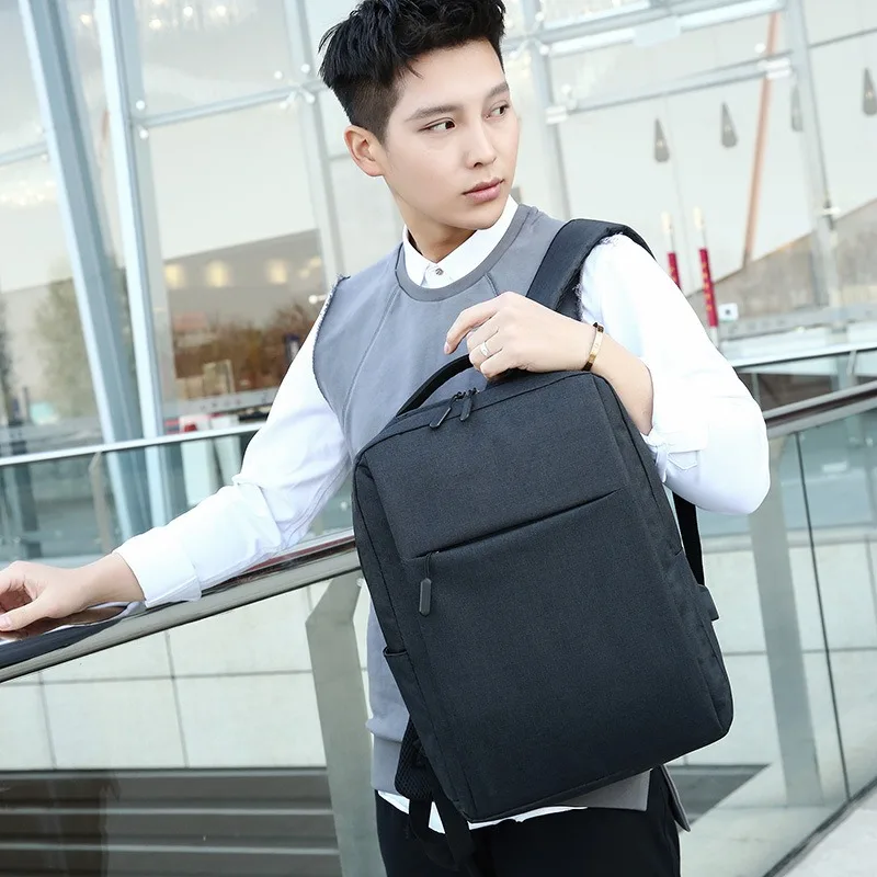 

2025 New Backpack Fashion and Versatile Student School Bag USB Charging Commuting Simple Business Computer Bag