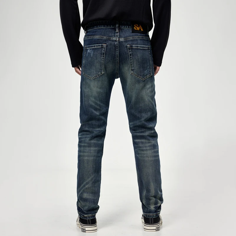 New trendy brand needle sewn patch slim fit small straight leg jeans with heavy embroidery and cool personality pants