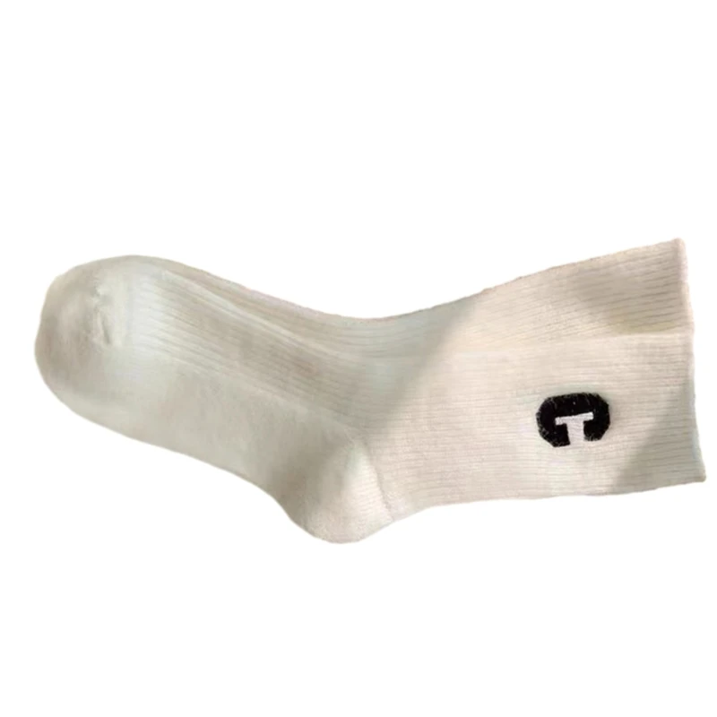 Chaussettes d'hiver unisexes douces, chaussettes maison confortables couleur unie avec accrocheur