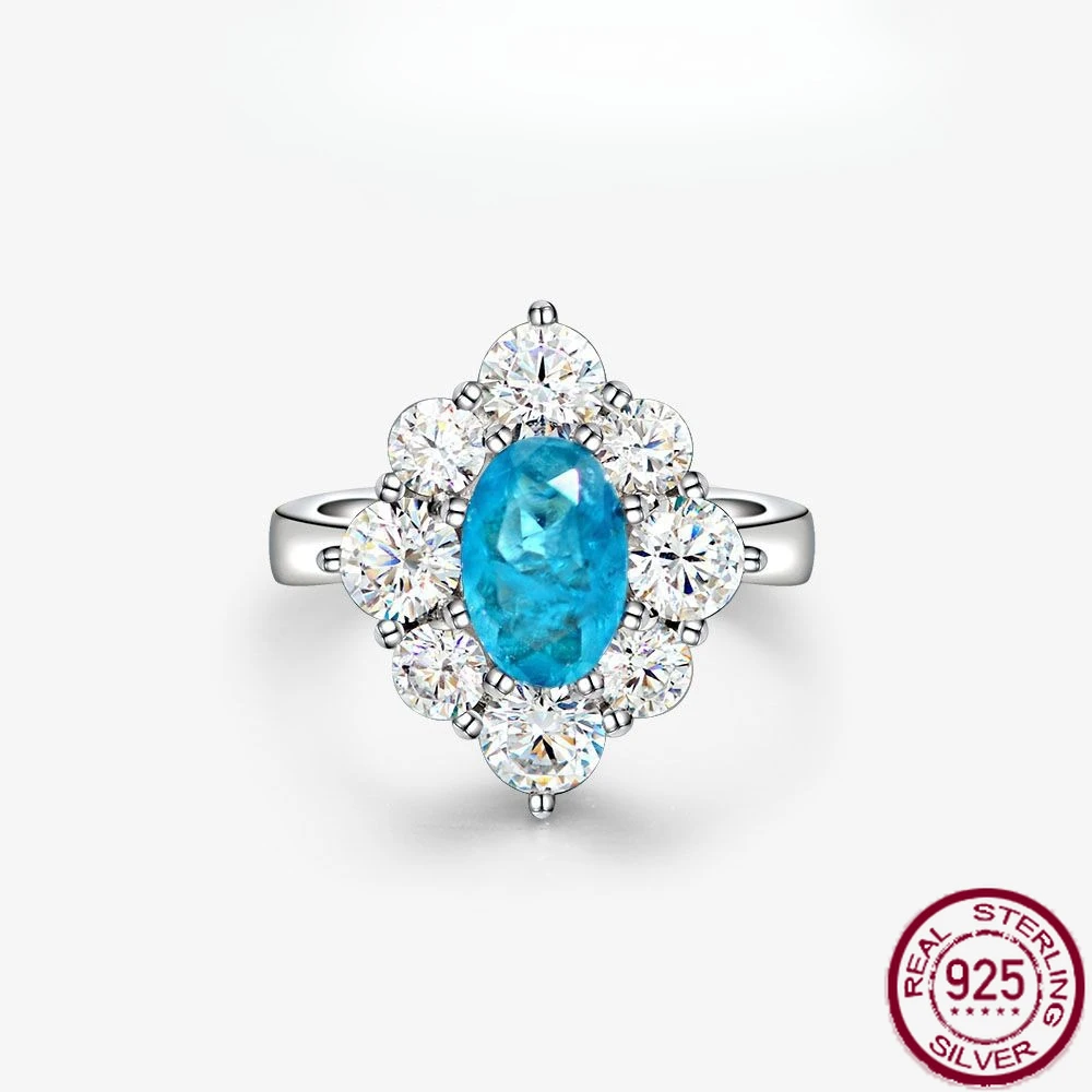 

New egg shaped 6 * 9 Paraiba blue ring with European and American fashion temperament s925 silver 1.5ct wedding jewelry
