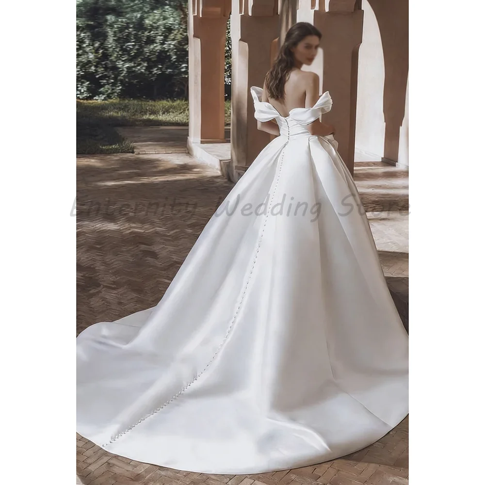Off Shoulder Puff Sleeve Satin A Line Wedding Dress Sweetheart Ruched Bodice 3D Flower Long Train Bridal Gown