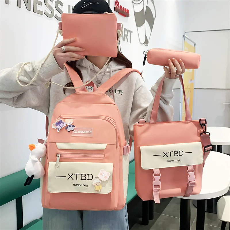 Schoolbag female fresh and sweet new Harajuku Student Backpack contrast color four piece large capacity Backpack