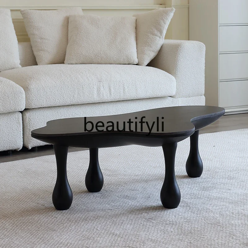 

French retro coffee table living room black rock slab minimalist special-shaped design sense cloud