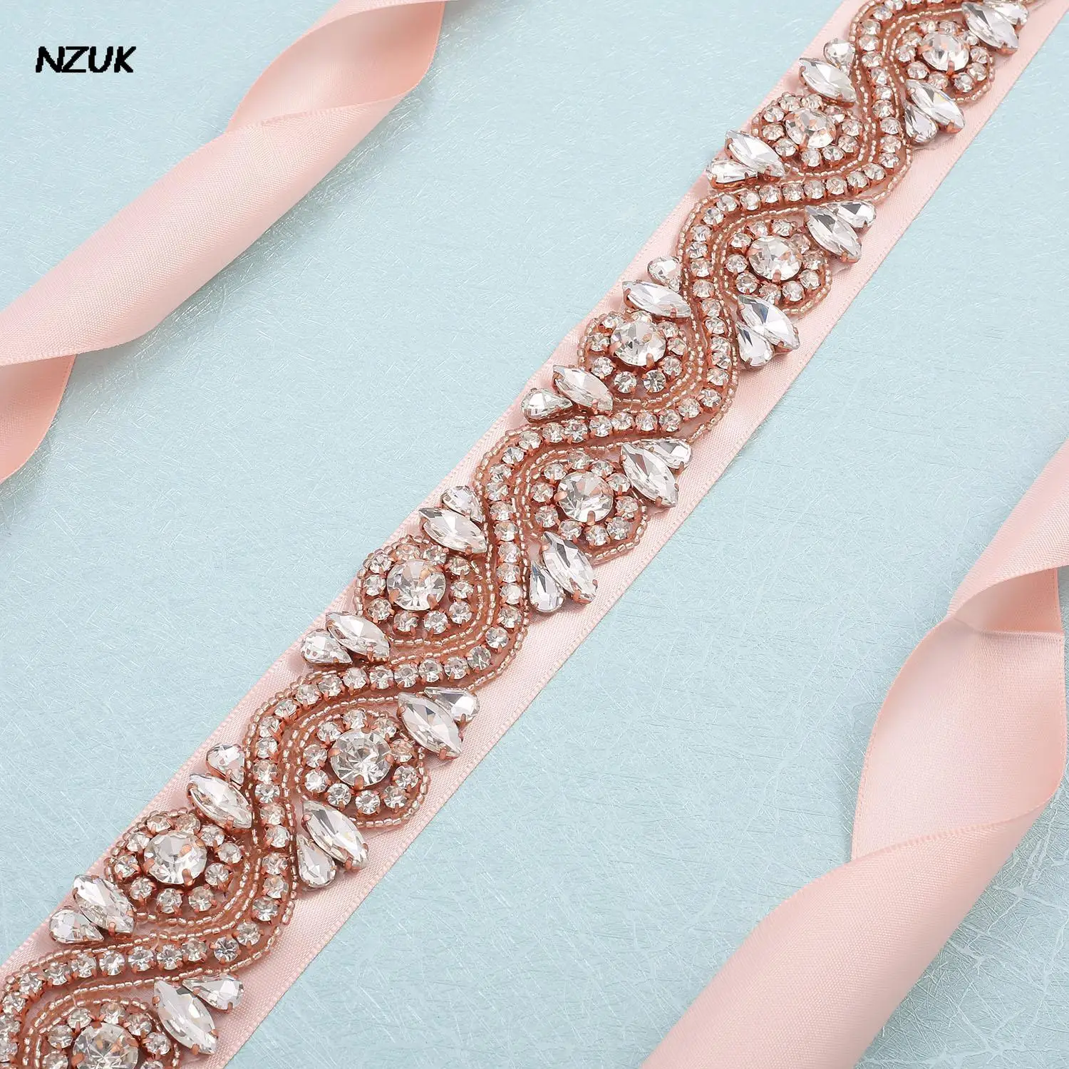 NZUK Clear Rhinestone สำหรับชุดแต่งงานคริสตัลเข็มขัดอัญมณี Rose Gold เข็มขัดเพชรเจ้าสาวอย่างเป็นทางการตกแต่งเข็มขัด