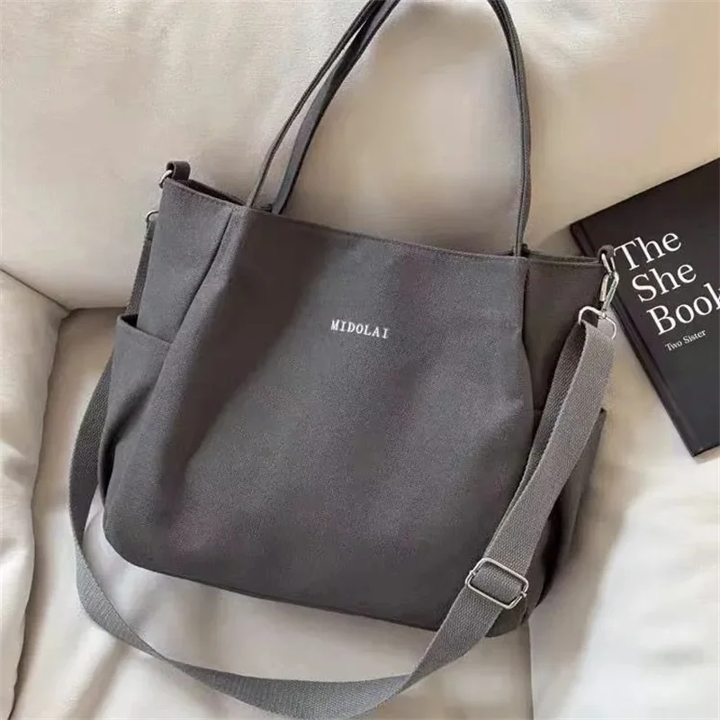 

2025 Ladies Hand Bags Female Handbag Large Capacity Canvas Tote Bags for Work Commuting Carrying Bag College Style Messenger Bag