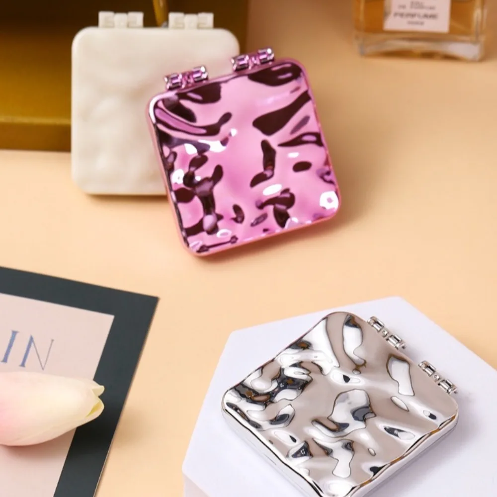 مرآة مكياج صغيرة قابلة للطي، مرآة تزيين مربعة، مرايا يدوية محمولة، مرآة جيب مدمجة مبتكرة على الوجهين