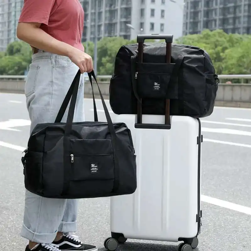 Hand-held Drawbar Travel Bag Women's Business Foldable Travel Clothing Storage Package 2025 Newest Moving Luggage Bag
