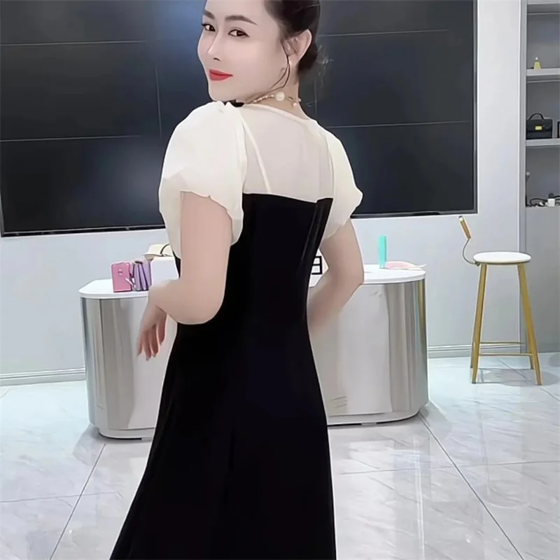 2024 Summer New Splicing Fake Two-piece French Waist-shrinking Little Black Skirt Short-sleeved Meat-covered Belly Dress Female