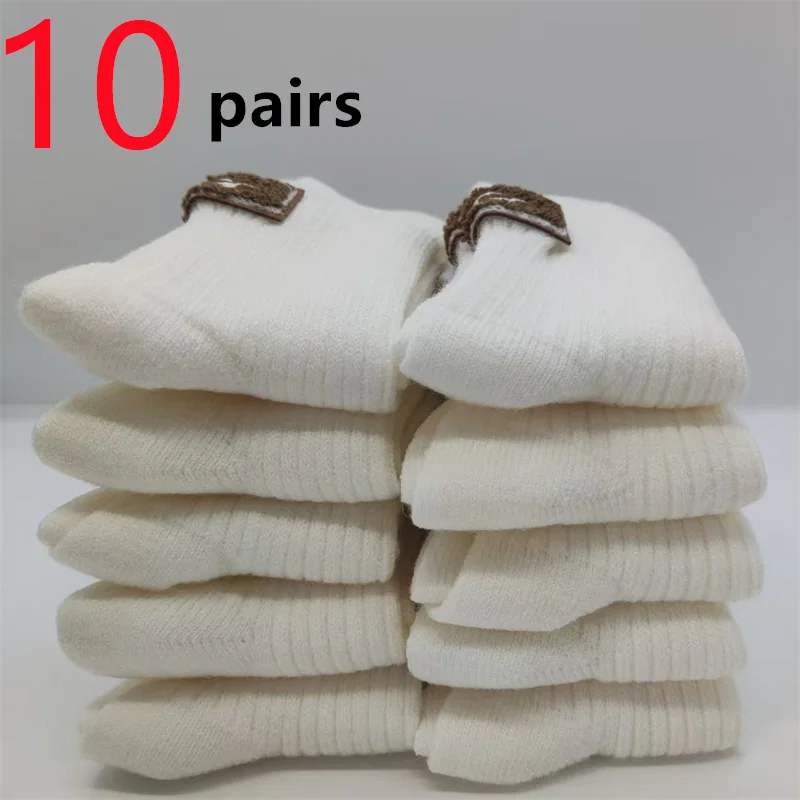 Calcetines de mujer Ins calcetín de tubo medio mantener caliente tejido bota de nieve femenina calcetín talón etiqueta peluda calcetines de mujer invierno nuevo 1/5/10 pares