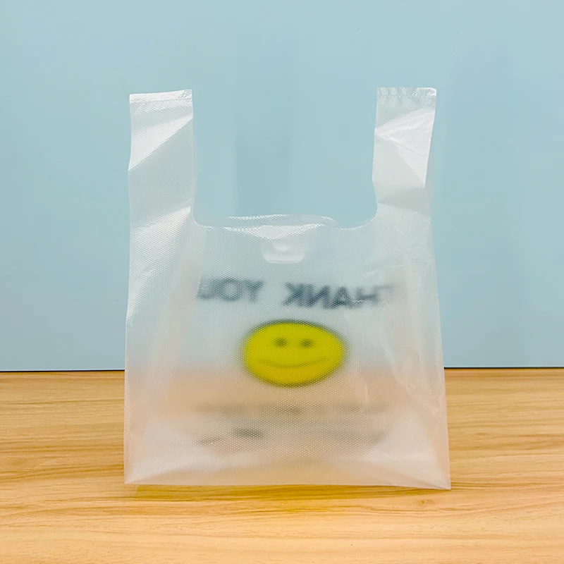 Transparent smiling face bag thickened takeout food bag commercial doggy bag convenient bag wholesale plastic bag vest bag