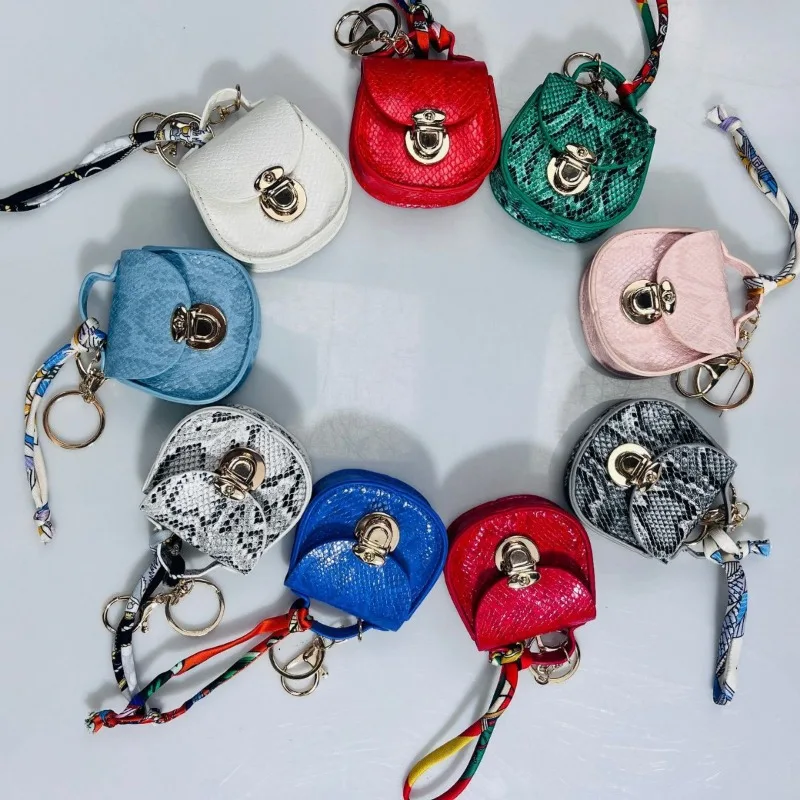 Online celebrity new explosions Joker saddle bag coin purse pendant portable multifunctional bag pendant key chain. cute wallet
